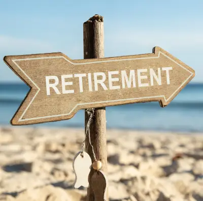 Sign shape like an arrow pointing to the right saying retirement